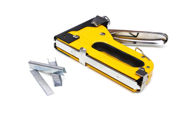 Heavy duty staple gun with three different types of staples - Photo, Image