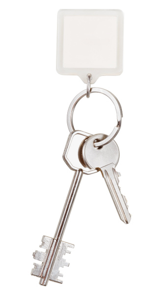 Paar Schlüssel und quadratischer Schlüsselanhänger am Ring - Foto, Bild