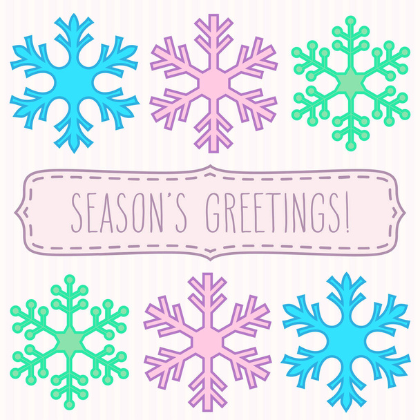 Snowflakes in rows and a frame with hand written season's greetings. - Vektor, Bild