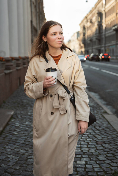 woman with disposable cup on the street - Valokuva, kuva