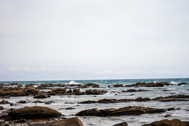 The beautiful ocean by the rocky shore - Photo, image