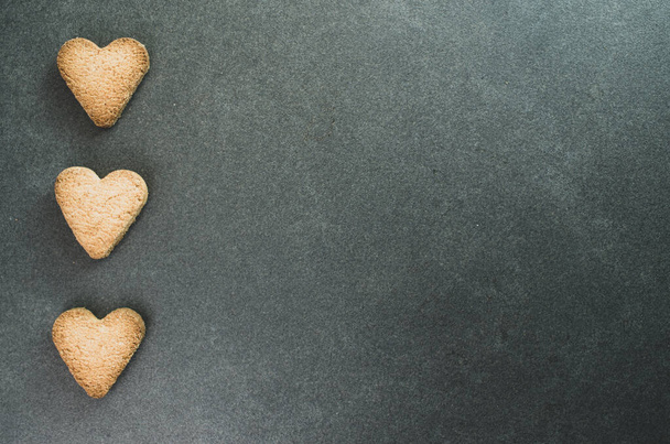 A closeup shot of hearth shaped cookies - Photo, Image