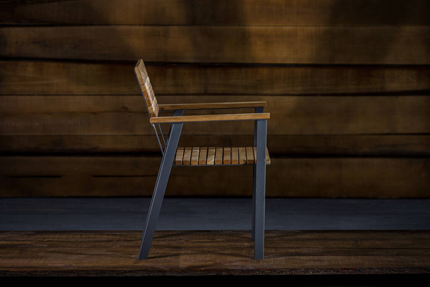 A closeup of a loft-style chair with armrests - Fotografie, Obrázek