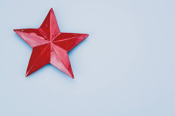 A closeup shot of a red star Christmas decoration - Foto, Imagem