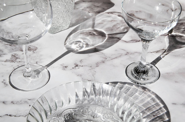 A closeup shot of crystal glasses and a bowl - 写真・画像