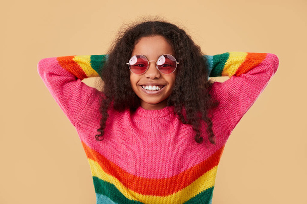 Happy black kid in rainbow sweater - Zdjęcie, obraz