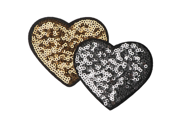 Golden and silver sequin heart patches isolated on white background - Фото, изображение