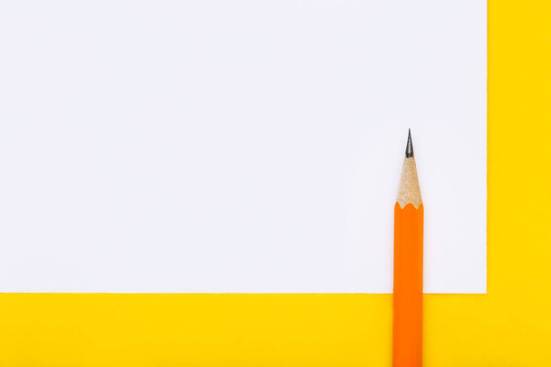 Yellow pencil on colorful background - Foto, Imagen