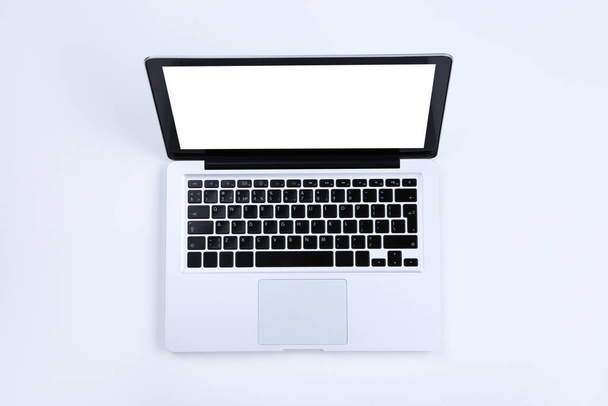 Laptop computer on grey background - Zdjęcie, obraz