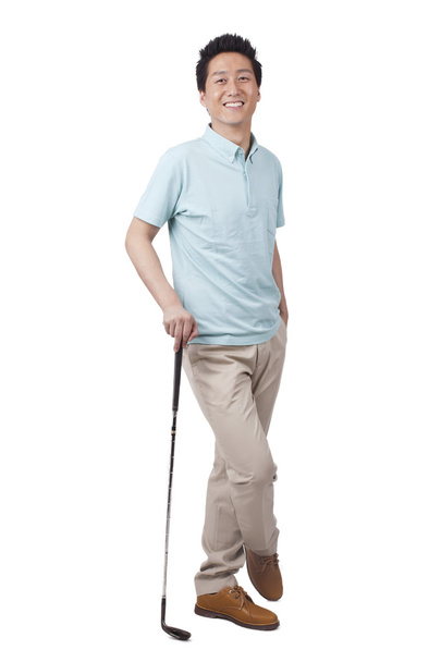 Young man  golfing - Fotó, kép