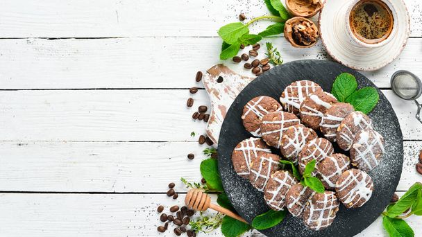 Chocolate cookies with peanuts. Baking. Top view, free copy space. - Фото, зображення