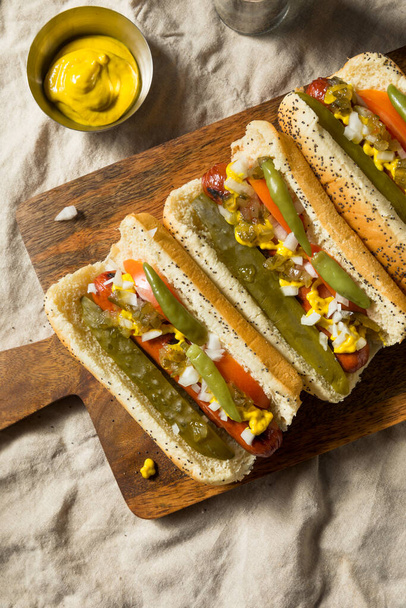 Homemade Chicago Style Hot Dogs with Mustard Relish Onion and PIckle - 写真・画像