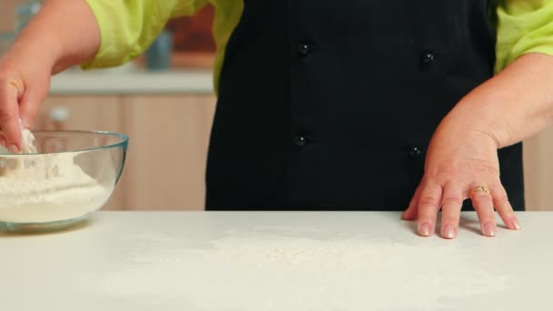 Hand spreading flour - Footage, Video