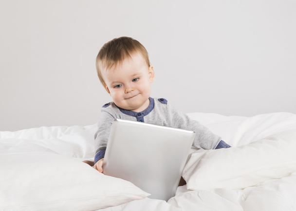 Baby with digital tablet - 写真・画像