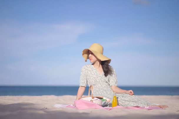 Asian  women picnic on the beach  - Photo, Image