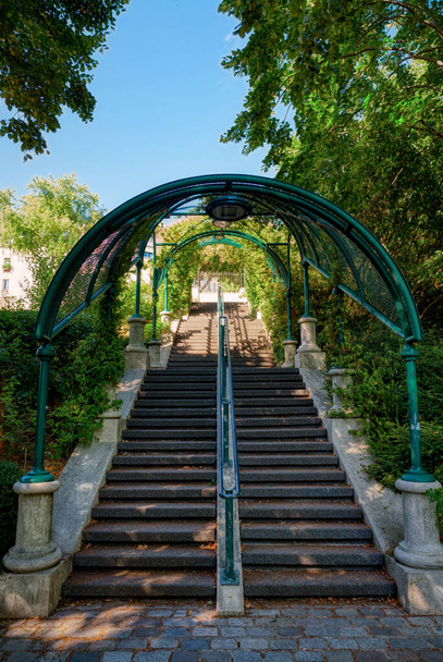 Paris, France - July 20 2020: Stairs with arcade at the Parc de Belleville in Paris, France - Photo, image