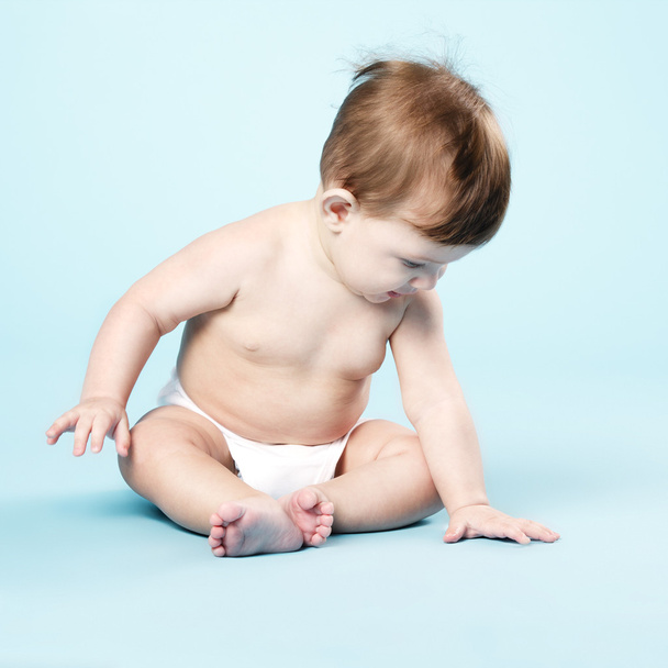 happy baby on blue background - Foto, immagini
