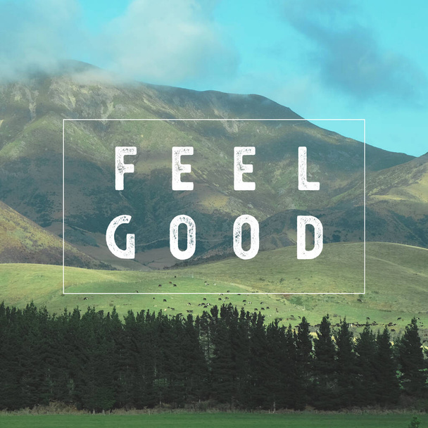 Citazione motivazionale ispiratrice "Feel Good". con sfondo vista montagna. - Foto, immagini