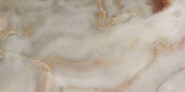 Gepolijst beige marmer. Echte natuurlijke marmeren stenen textuur en oppervlakte achtergrond. beige onyx marmer - Foto, afbeelding