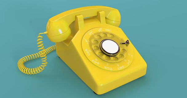 Yellow colour vintage rotary telephone on green background | Rotary dial | Wired telephone | Old Phone with receiver  - Foto, Bild