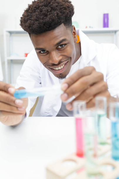 young lab assistan working in the laboratory - Fotó, kép