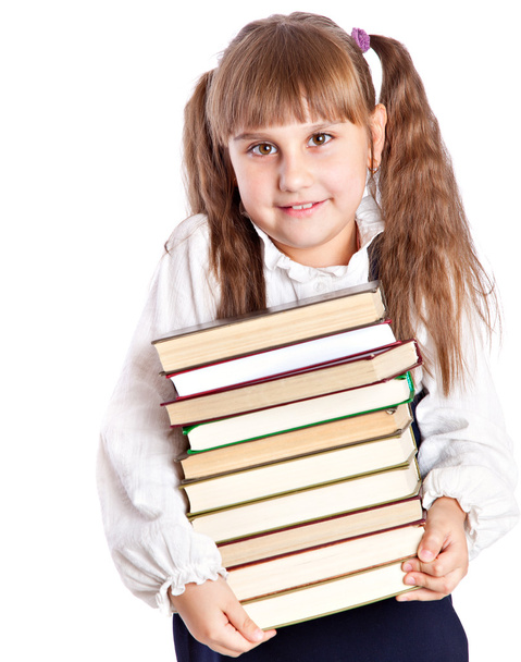 Schoolgirl with books is looking up - Zdjęcie, obraz