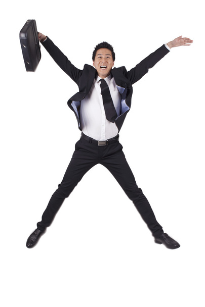 Businessman jumping with joy - Foto, imagen
