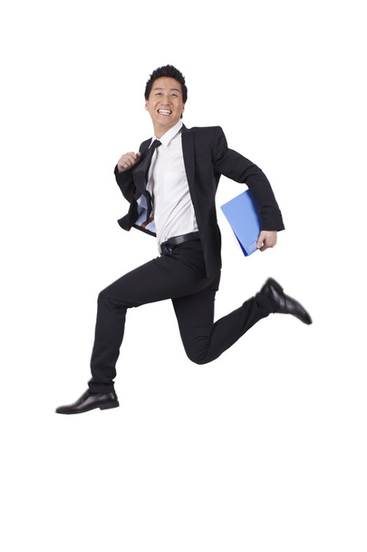 Businessman jumping with joy - Foto, afbeelding