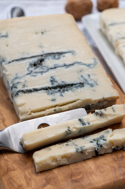 Italian food, buttery or firm blue cheese made from cow milk in Gorgonzola, Milan, Italy close up - Photo, Image