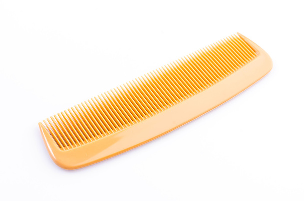 Comb on white - 写真・画像