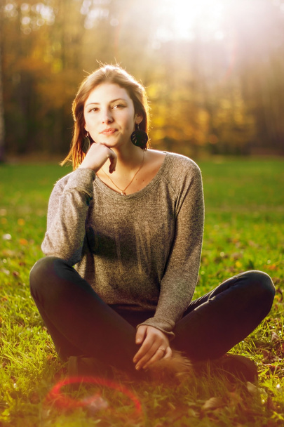 Portrait of young beautiful woman on green background summer nature. - Φωτογραφία, εικόνα