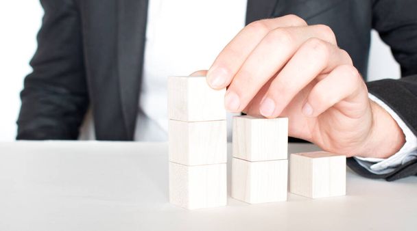 organization and team structure symbolized with cubes - 写真・画像