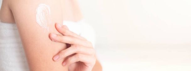 Woman applying arm cream,lotion , Hygiene skin body care concept - Foto, Bild