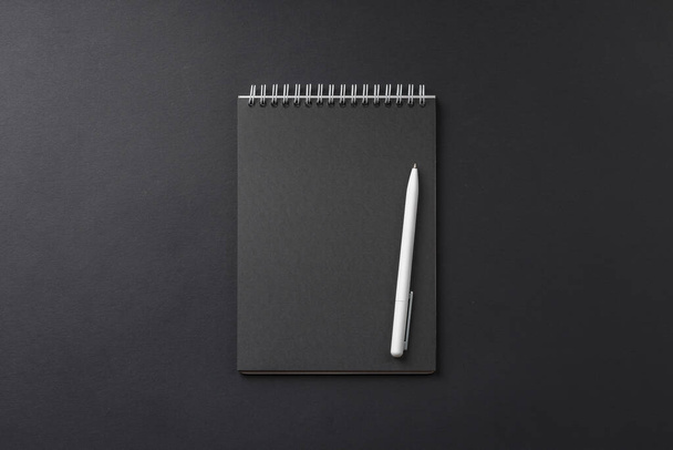 notebook with white pen on black background - Photo, Image