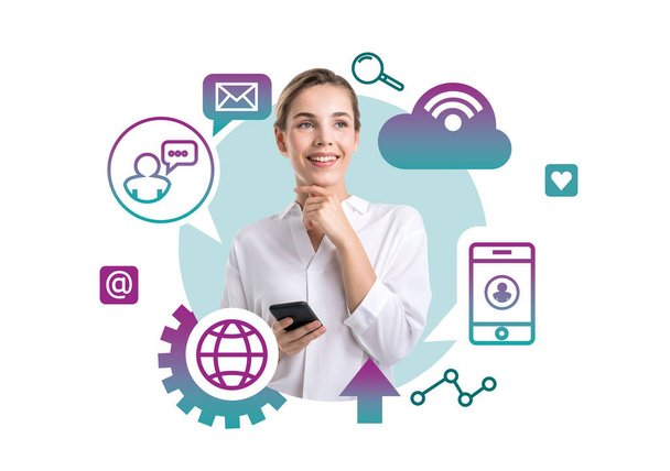 Giovane donna d'affari allegra con smartphone in piedi su sfondo bianco con icone di cloud computing intorno a lei - Foto, immagini
