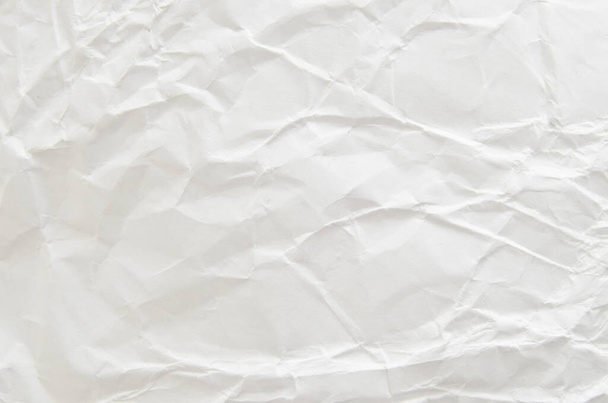 background with scattered overlay of crumpled papers. - Photo, Image