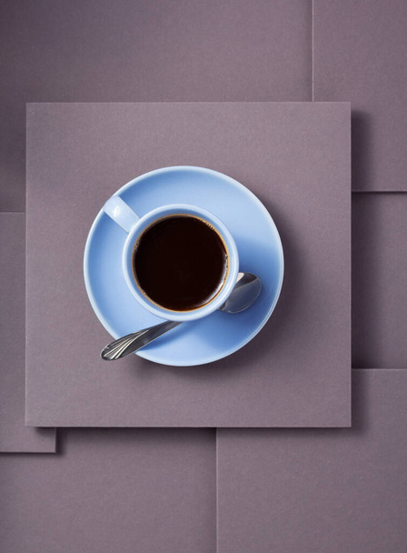 cup of coffee at grey background texture, minimalism concept style - Foto, afbeelding