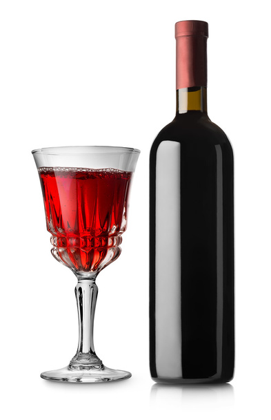 Bir bardak kırmızı şarap ve şişe. - Fotoğraf, Görsel