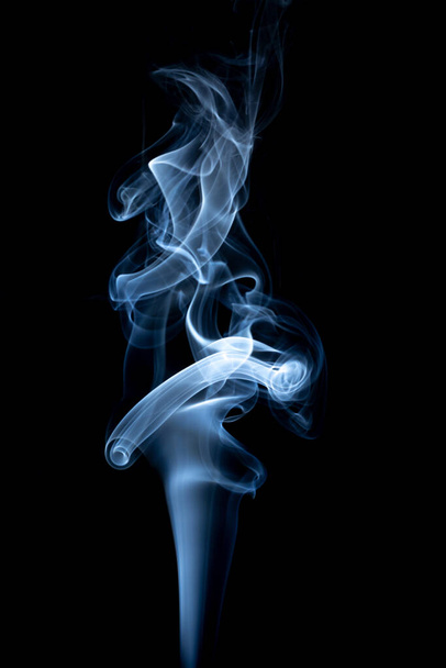 Movement of smoke on black background - Photo, image