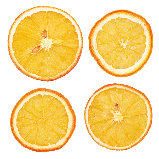 Tranches d'orange séchées, isolées sur fond blanc - Photo, image