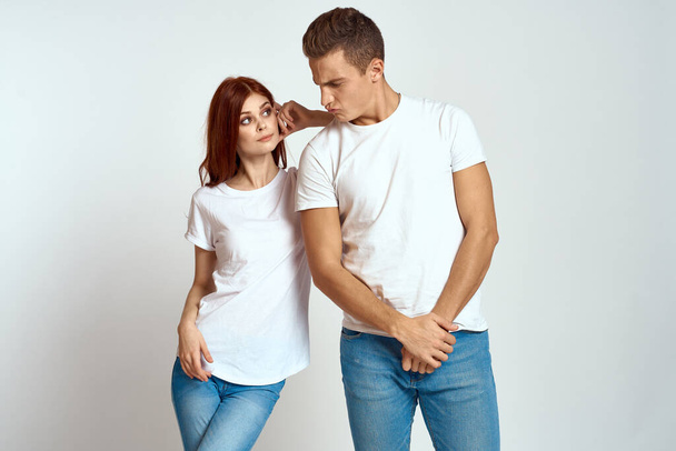 family couple in love jeans white t-shirt emotions fun man and woman having fun  - Fotoğraf, Görsel
