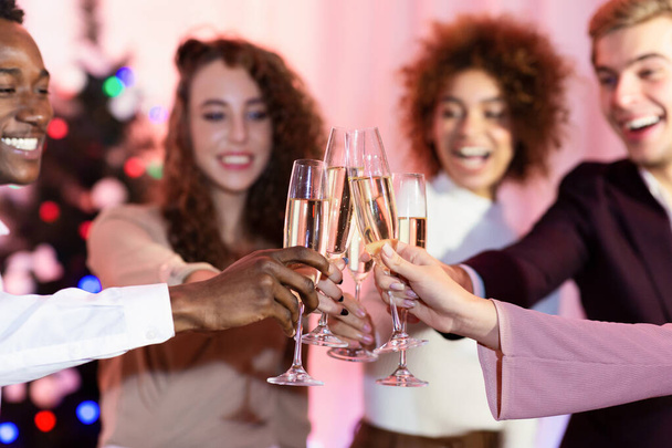 Happy Multiracial Friends Toasting Celebrating New Year Standing At Home - Фото, изображение