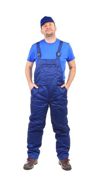 Worker with arms in pockets. - Foto, imagen