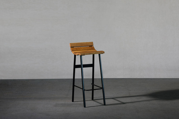 A closeup of a concave bar stool, loft-style - Photo, Image