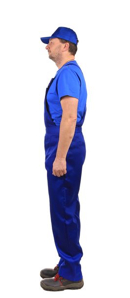 Worker in blue overalls - Φωτογραφία, εικόνα