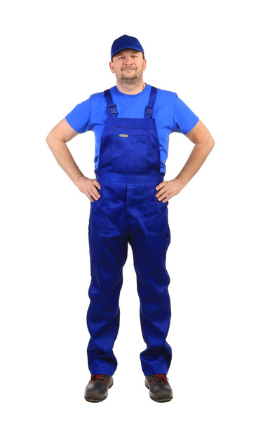 Worker in blue overalls - 写真・画像