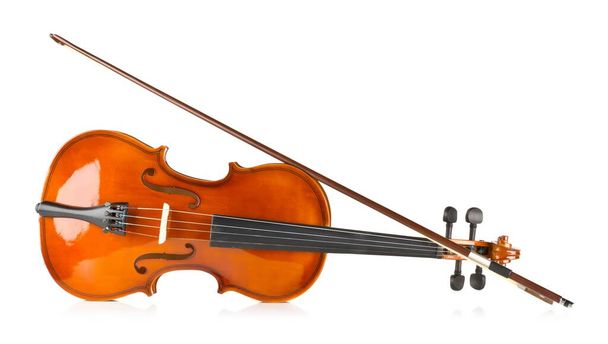 Side view of brown wooden fiddle or violin, classic musical instrument, with bow over white background - Zdjęcie, obraz