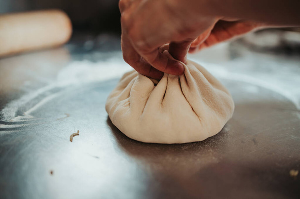 A closeup of a dough making process - Fotoğraf, Görsel