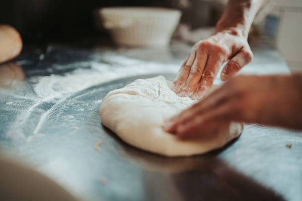 A closeup of a dough making process - Foto, Bild