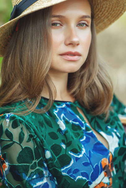 Beautiful woman in nature. Young girl in a hat.  - Foto, Imagem